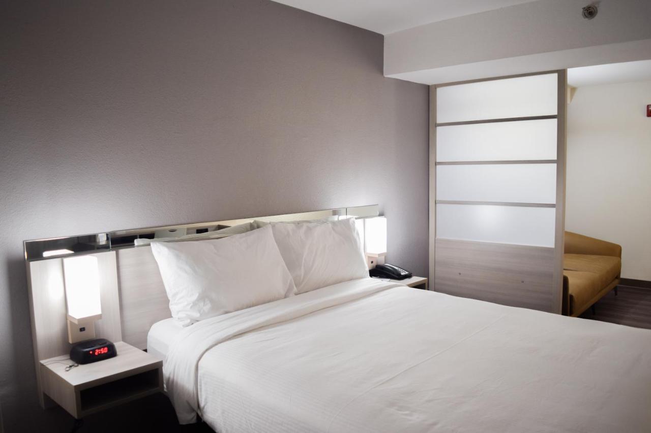 Travelers Inn And Suites Ρόλι Εξωτερικό φωτογραφία